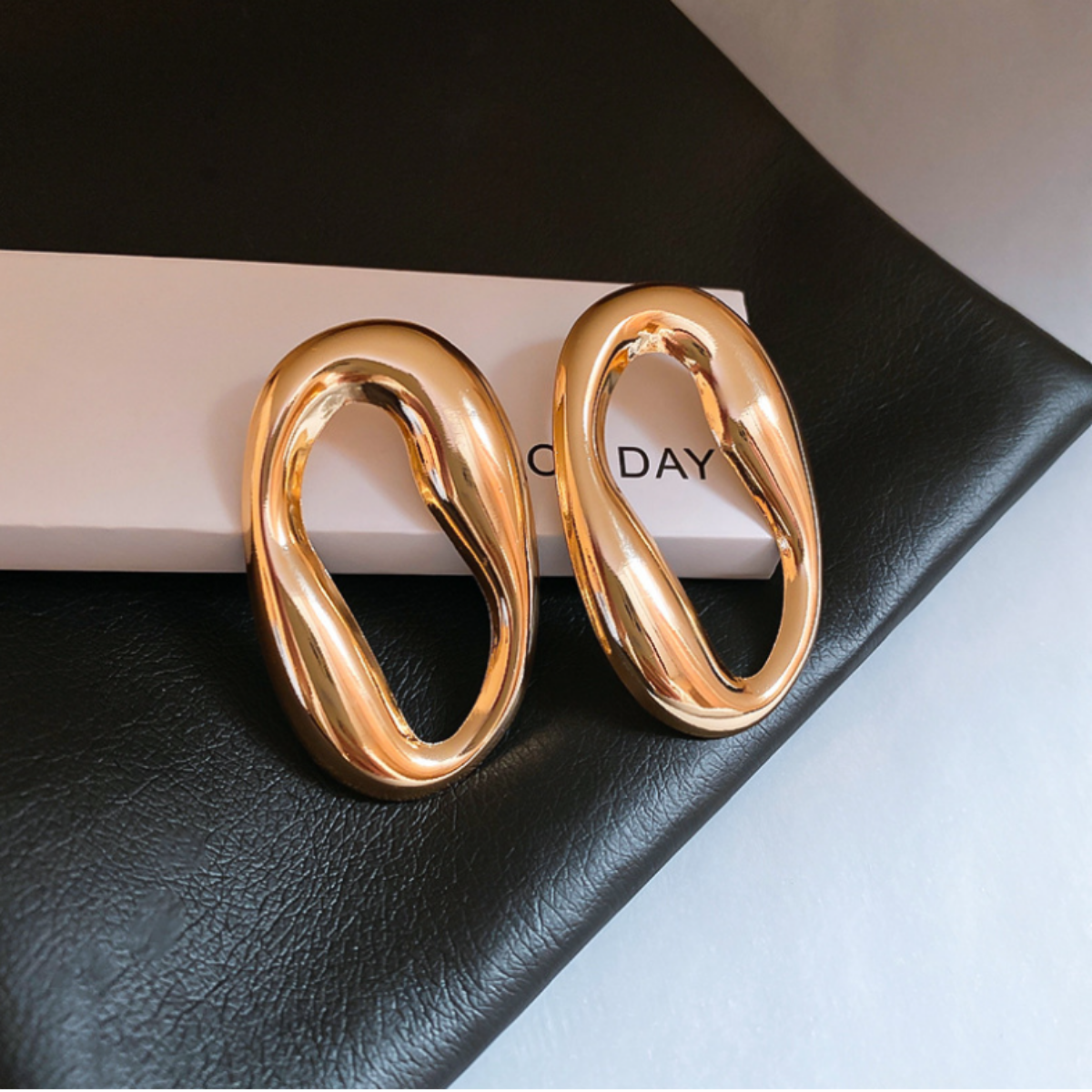 Σκουλαρίκια ΄΄Golden Flow΄΄